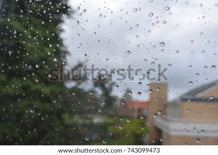 Raindrops on window on a rainy day