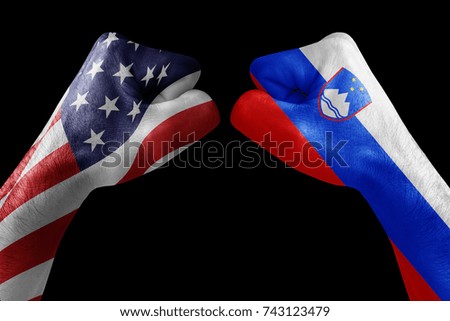 conflict between USA vs Slovenia, male fists - governments conflict concept,  Flags written on hands USA, USA Flag, USA  counter, fists symbol war