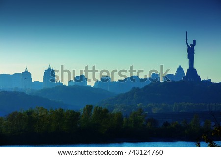 Skyline, Kiev city in the evening. Right bank of the Dnieper River  Royalty-Free Stock Photo #743124760