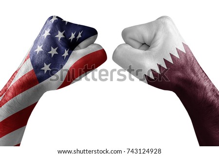 conflict between USA vs Qatar, male fists - governments conflict concept,  Flags written on hands USA, USA Flag, USA  counter, fists symbol war