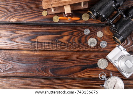 A set of a photographer on a brown wooden table background
