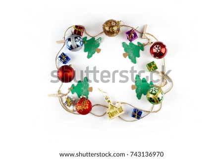 "Merry Christmas and Happy New Year"- Four green Christmas trees with red round toys and small gifts on the pure white background