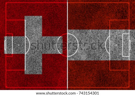 flag of the Switzerland and Austria  painted on football  soccer field divided with middle line, match, sport