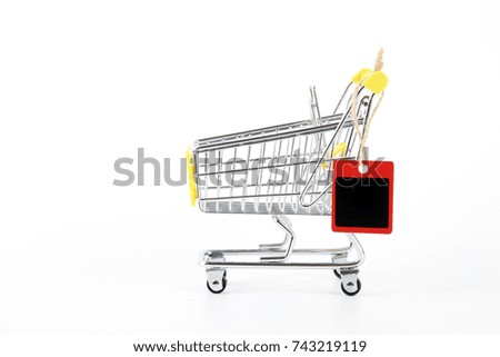A mini shopping trolley with a black board for wording