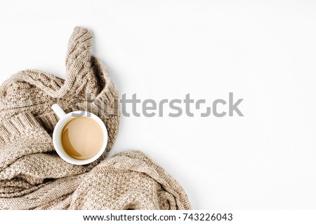 Cup of coffee  with warm plaid. Copy space. Flat lay, top view Royalty-Free Stock Photo #743226043