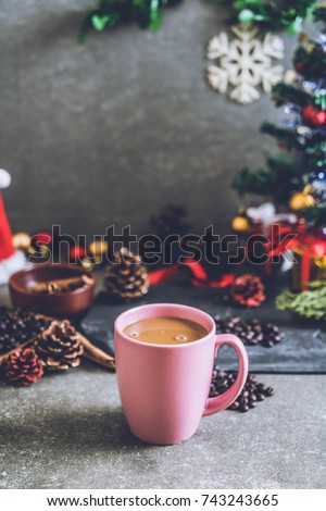 hot coffee cup with christmas decoration - vintage effect filter