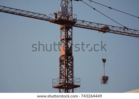 a crane on blue sky background