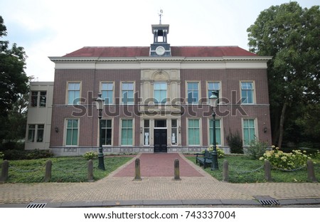 Old orphanage, which have also used as Town Hall in the center of Moordrecht, The Netherlands Royalty-Free Stock Photo #743337004