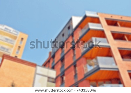 Abstract blur of modern apartment building.