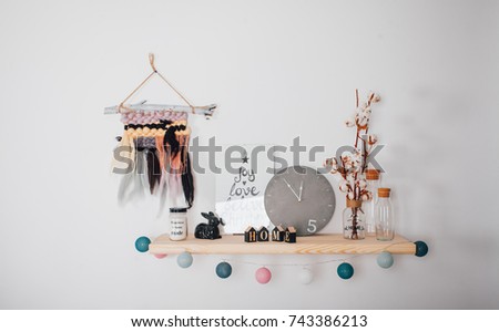 shelf on the wall, decor, clocks, candles, toys