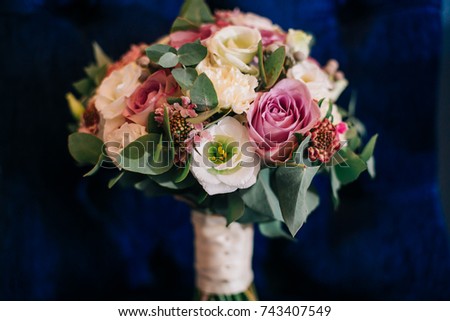 Wedding bouquet. The bride's bouquet. Beautiful bouquet of pink, yellow, white.