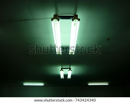 Fluorescent lamps in dark basement