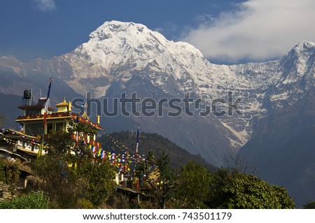 Buddhist monastery in the mountains
Nepal, Pokhara, Gandryuk village: Buddhist monastery in the background of the ice-covered and snow-covered summit of Annapurna South. Royalty-Free Stock Photo #743501179