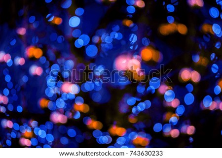 Christmas lights background with bokeh effect, defocused new year backdrop