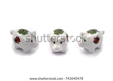 Pig figurine stock images. Pig on a white background. Pig decoration. Pig of happiness