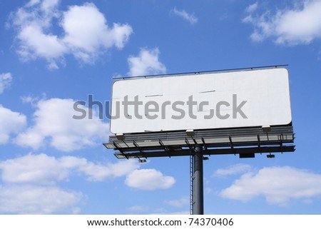 Empty billboard on cloudy sky.