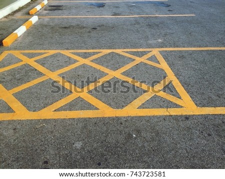 Yellow line on car parking background