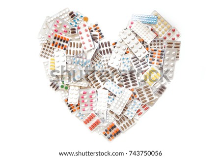 Various medications, medicine and tablets in packages.