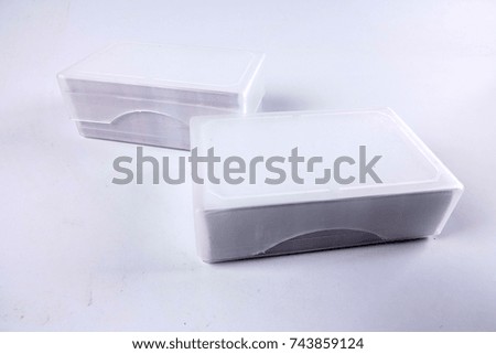 Two boxes of calling cards isolated on white.
