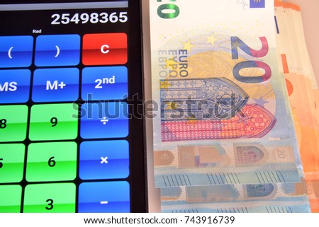 save, earn, and invest money

a bunch of Euro banknotes and a calculator next to it. close-up