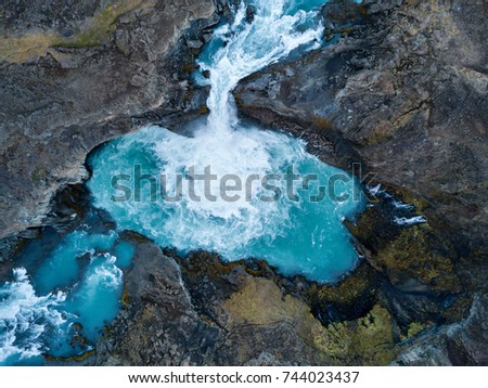 Aldeyjarfoss is an amazing waterfall in northern Iceland. Aerial photography captured by drone.. Royalty-Free Stock Photo #744023437