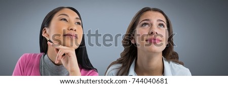 Digital composite of Two women looking with grey background