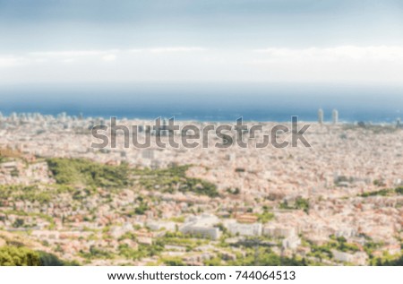 Defocused background with scenic aerial view from Tibidabo mountain over the city of Barcelona, Catalonia, Spain. Intentionally blurred post production for bokeh effect