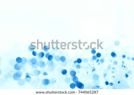 Abstract blue  winter elegant bokeh background and flares wallpaper design? Seasonal cooling light decorative abstract design element