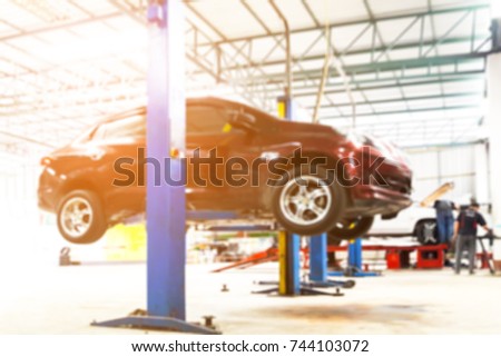 Blur image of inside tire store, use for background.