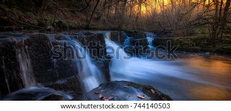 Evening at the Afon Pyrddin river near Pontneddfechan, on the south side of Brecon Beacons National Park, South Wales, UK, known as Waterfall Country