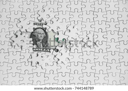 Missing jigsaw puzzle pieces on money dollar background, Business solution concept ,key for success,Flat Lay