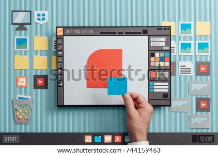 Graphic design and vector illustration software interface: a designer is making a composition with shapes, collage and paper cut composition Royalty-Free Stock Photo #744159463