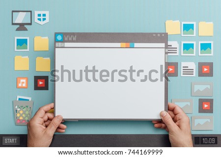 Blank web page on a browser, the user is holding the window, internet and communication concept, collage and paper cut composition
