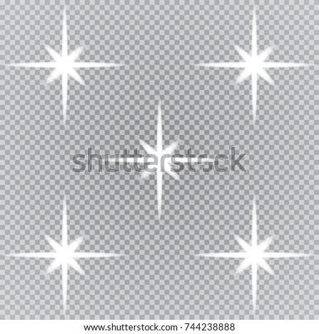 
Set of shining lights isolated on a transparent background. The flash flashes with rays and a searchlight. Light effect of glow. The star flashed with sparkles.