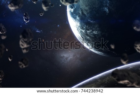 Planets, glowing stars and asteroids. Deep space image, science fiction fantasy in high resolution ideal for wallpaper and print. Elements of this image furnished by NASA