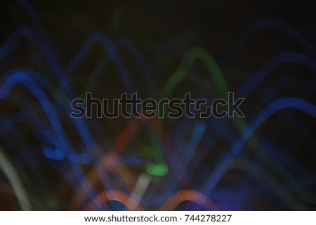 Blurred Defocused and Painting Light Trail on a Wet Rainy Night