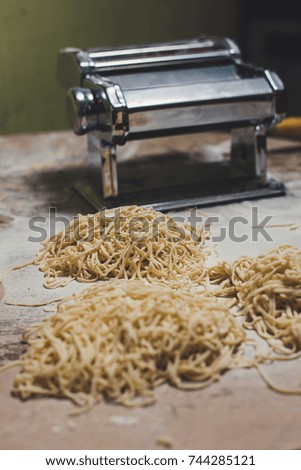 Home made pasta with traditional pasta machine