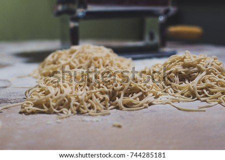 Home made pasta with traditional pasta machine