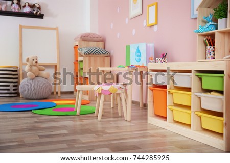 Beautiful interior of game room in kindergarten Royalty-Free Stock Photo #744285925
