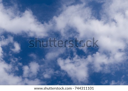 bright blue sky with clouds and sun. cumulus, background, weather.