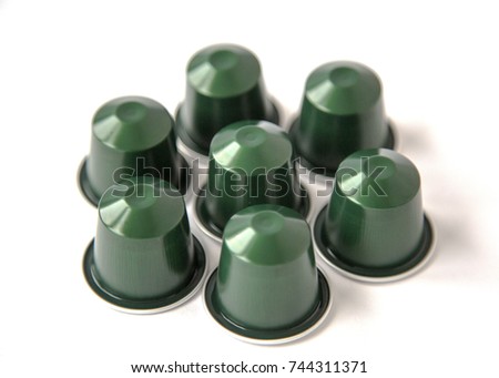 Coffee Capsules Isolated on White Background Natural Light Selective Focus