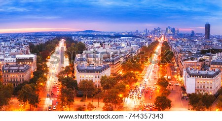 Paris, France. Panoramic view from Arc de Triomphe. La Defense district and Avenues. Europe. Twilight scenery. Paris is extremely popular and famous European city and travel destination.