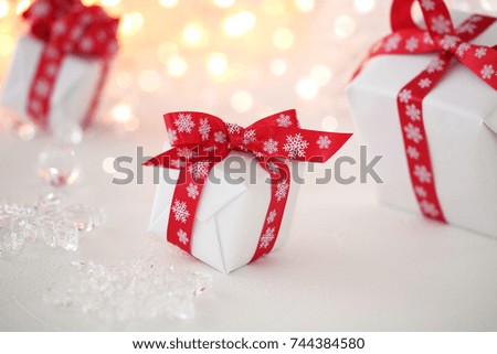 Christmas gifts with decoration on christmas illumination background