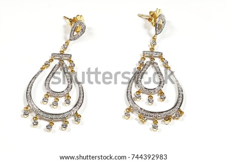 High Value Gems Stone accessories, Gold, Diamond,  earrings pair. Studio lighting white background, HDR stacking macro photo