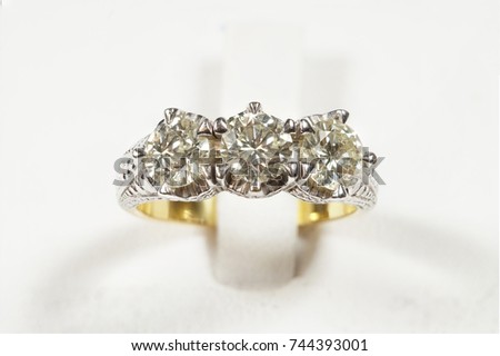 High Value Gems Stone accessories, Gold, Diamond, wedding ring. Studio lighting white background, HDR stacking macro photo