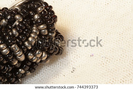 Bulk Mix Accessories close up to see texture detail of necklace silver black beads twist and valuable decorate things, HDR Stacking Macro Photography