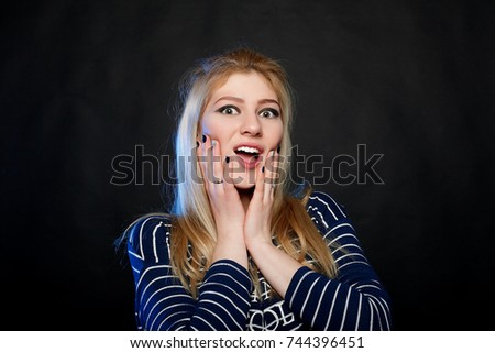 emotions, health, people, beauty concept -Surprised happy beautiful woman isolated on black background