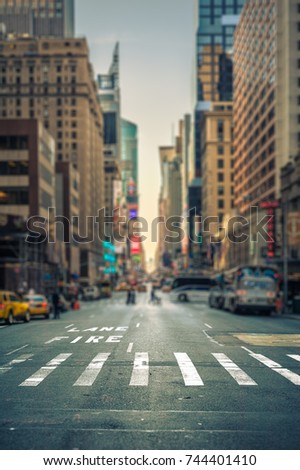 Tilt-shift view of a crosswalk in a New-York city avenue, USA