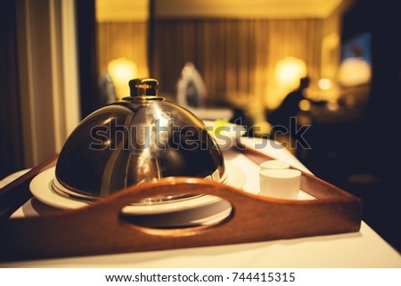 Dinner in the Hotel Provided by Hotel Restaurant Room Service. Business Travel Theme. Royalty-Free Stock Photo #744415315