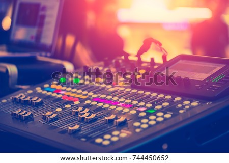 Audio Sound Mixer Adjusting Professional Sound Engineer Operator in Concert Hall